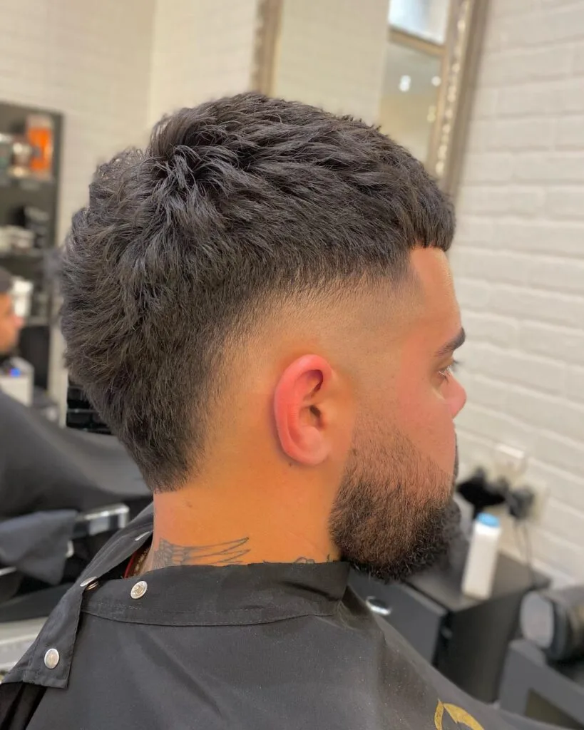 Curly Contours: Burst Fade Haircut